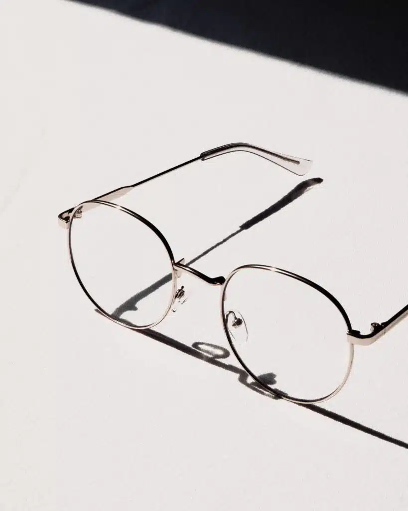 Eyewear elegantly placed on a pristine white table, showcasing the design and detailing