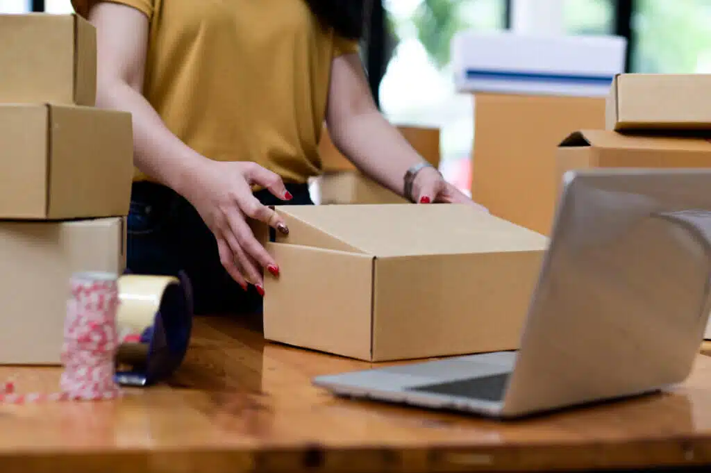 Online sellers are packing boxes for shipping, Online shopping, Shipping parcels.