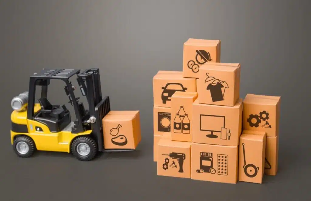 Yellow Forklift truck and boxes of goods. Transportation logistics infrastructure, import and export products delivery. Production, transport, cargo storage. Freight shipping. retail and supply
