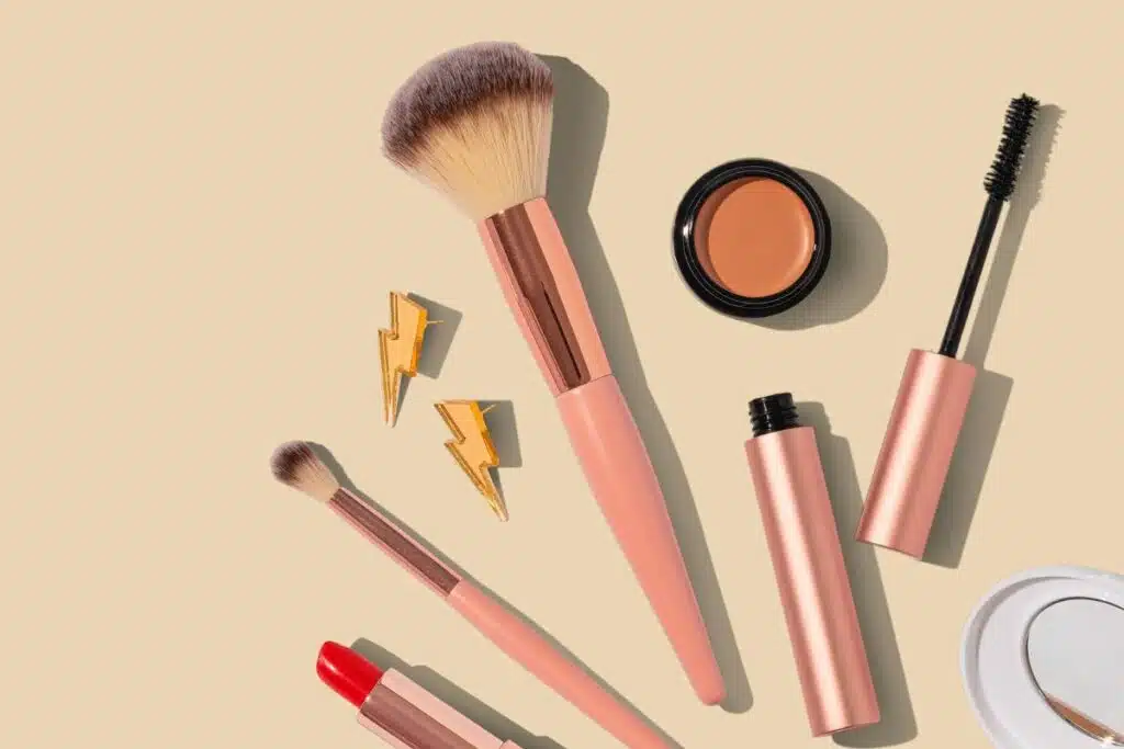 Image of a selection of cruelty-free makeup products including lipsticks, eyeshadows, and blushes, all arranged neatly to display their vibrant colors.