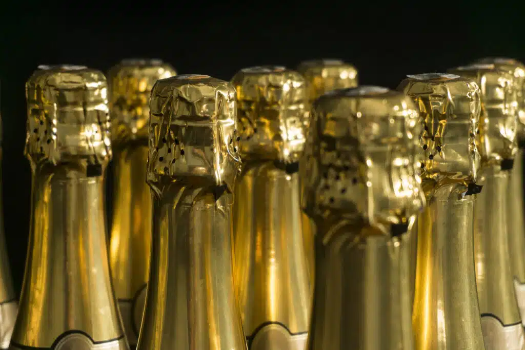 Collection of champagne or prosecco bottles