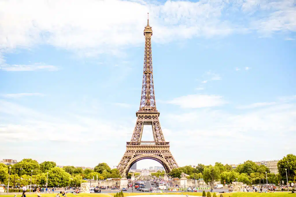 View on the famous Eiffel tower on the blue sky background in Paris