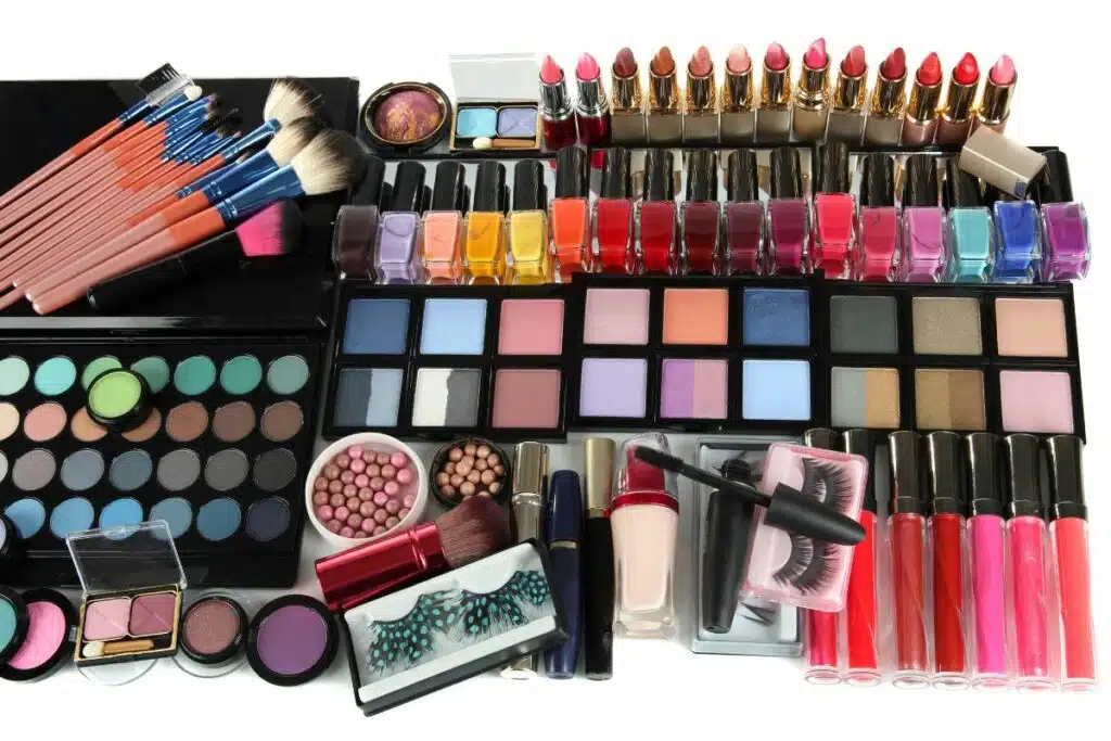 An array of popular cosmetic products displayed elegantly, showcasing a variety of trending makeup items such as lipsticks, eyeshadows, and blushes, reflecting current beauty trends and consumer preferences.